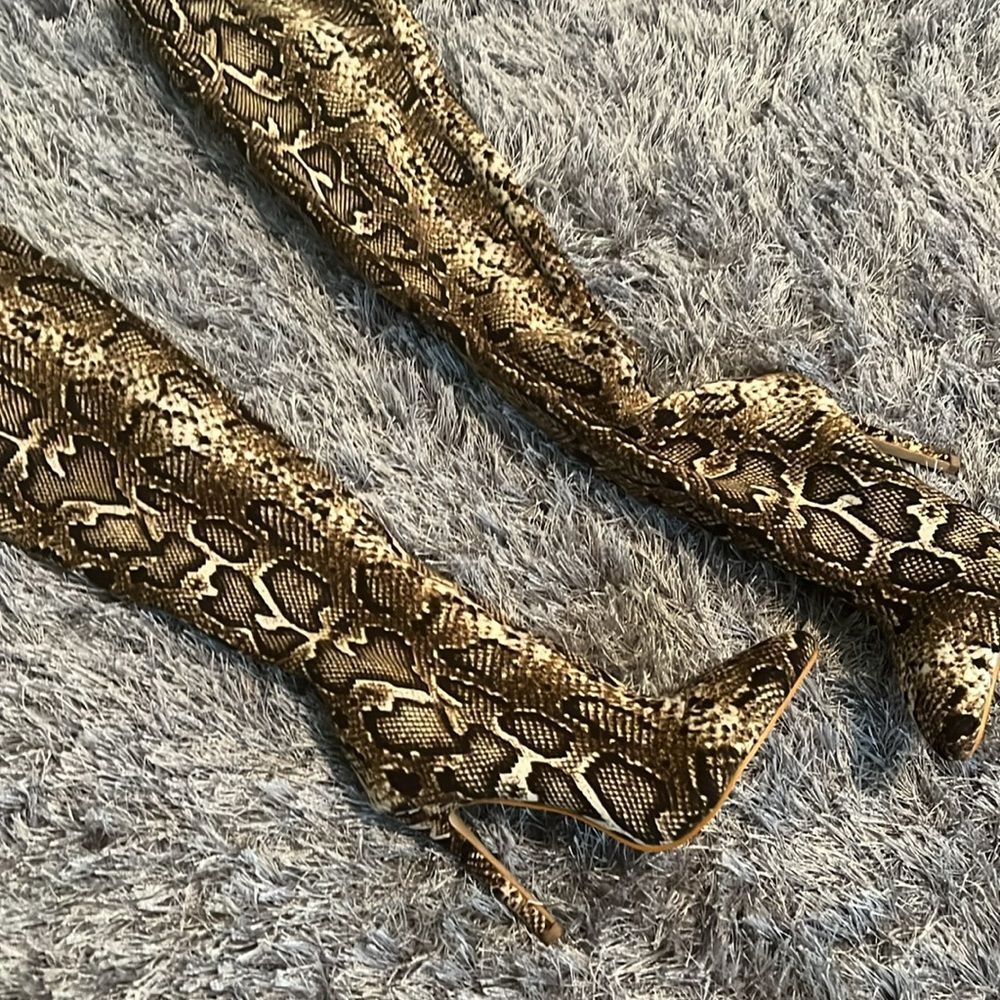 Snake print high heel boots